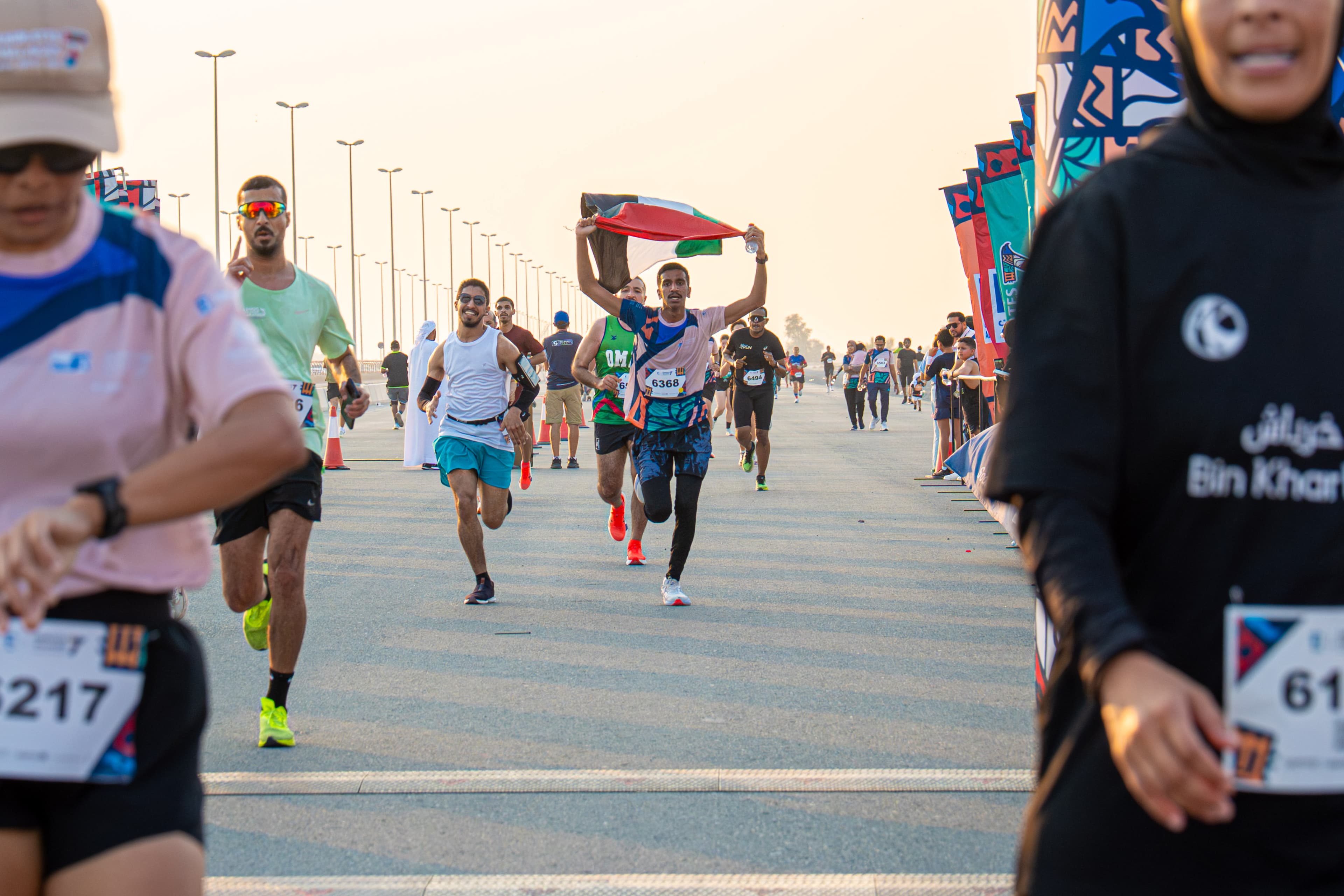 Runners celebrating an Emirates Villages race